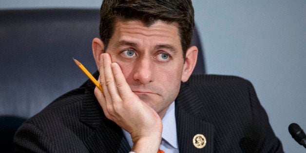 House Ways and Means Committee Chairman Paul Ryan, R-Wisc., listens as Treasury Secretary Jack Lew defends President Barack O