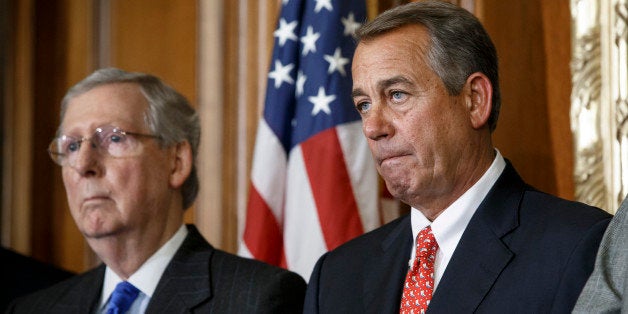 Speaker of the House John Boehner, R-Ohio, joined by Senate Majority Leader Mitch McConnell, R-Ky., left, leads a ceremony fo