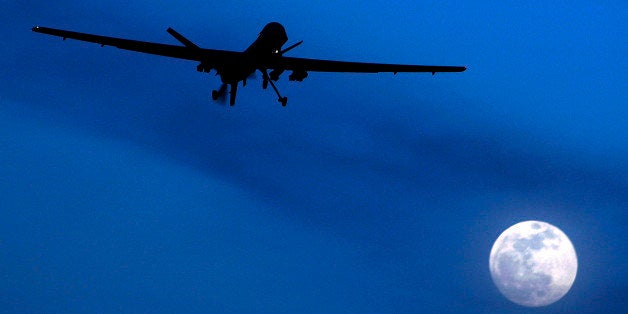 FILE - In this Jan. 31, 2010 file photo, an unmanned U.S. Predator drone flies over Kandahar Air Field, southern Afghanistan,
