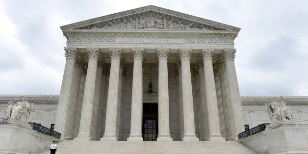 FILE - This Friday, Oct. 3, 2014 file photo, shows the U.S. Supreme Court in Washington. The Supreme Court is casting a skeptical eye on voter-approved commissions that draw a state's congressional district boundaries. The justices heard arguments Monday, March 2, 2015 in an appeal from Arizona Republicans who object to the state's independent redistricting commission that voters created to reduce political influence in the process. A decision against the commission also would threaten a similar system in neighboring California and could affect commissions in an additional 11 states. (AP Photo/Susan Walsh, File)