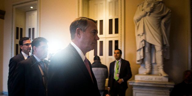 WASHINGTON, DC - MARCH 3: House Speaker John Boehner (R-OH) walks to the House floor to vote on the 'motion to table the Senate amendment' on the DHS Funding bill at the U.S. Capitol on March 3, 2015 in Washington, D.C. Speaker Boehner agreed to hold a vote on a 'clean' bill funding the Department of Homeland Security through the end of the budget year. (Photo by Gabriella Demczuk/Getty Images)