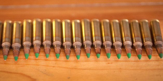 CHICAGO, IL - FEBRUARY 27: Green tipped armor-piercing 5.56 millimeter ammunition is shown on February 27, 2015 in Chicago, Illinois. The Obama administration has proposed banning the ammunition, which is popular among hunters and target shooters, because it can be used in pistols. Fear of a ban has caused a run on sales. (Photo Illustration by Scott Olson/Getty Images)