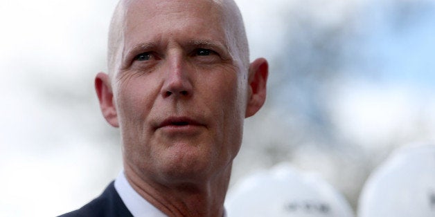 HIALEAH, FL - MARCH 09: Florida Governor Rick Scott attends a road expansion event at the Casa Maiz restaurant as he fields questions from reporters about climate change on March 9, 2015 in Hialeah, Florida. Recent reports indicate that the Florida governor allegedly issued orders for certain state agencies to not to use the term 'climate change' or 'global warming' in any official communications, emails, or reports. (Photo by Joe Raedle/Getty Images)