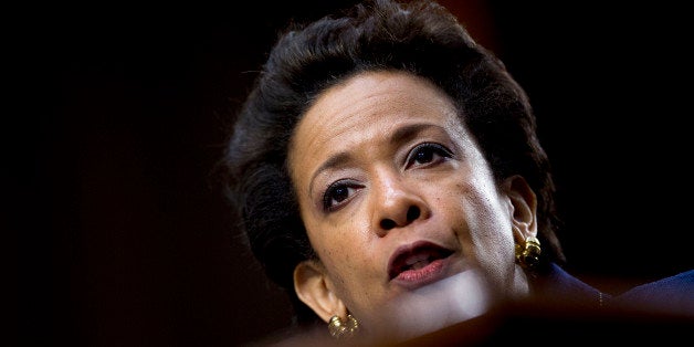 Loretta Lynch, Brooklyn prosecutor and nominee to replace U.S. Attorney General Eric Holder, speaks during a Senate Judiciary Committee nomination hearing in Washington, D.C., U.S., on Wednesday, Jan. 28, 2015. Lynch said that if confirmed as the next U.S. attorney general she would focus on battling cybercrime and improving relations between police and the communities they serve. Photographer: Andrew Harrer/Bloomberg via Getty Images 