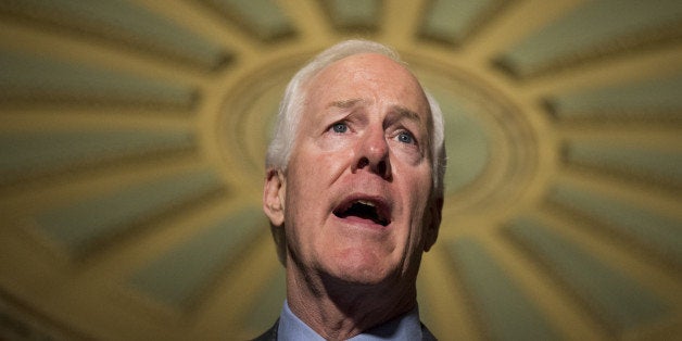 UNITED STATES - SEPTEMBER 9: Sen. John Cornyn, R-Texas, speaks to reporters in the Ohio Clock Corridor of the Capitol following the Senate policy luncheons on Tuesday, Sept. 9, 2014. (Photo By Bill Clark/CQ Roll Call)