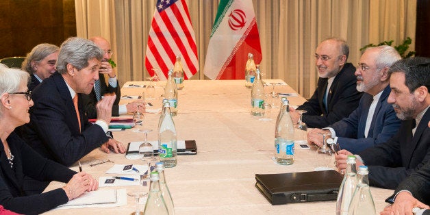 U.S. Secretary of State John Kerry, second from left, meets with Iranian Foreign Minister Mohammad Javad Zarif, second from right, for a new round of nuclear negotiations Wednesday, March 4, 2015, in Montreux, Switzerland. (AP Photo/Evan Vucci, Pool)