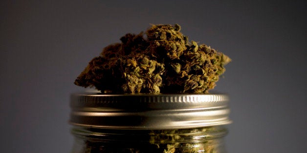 Marijuana strain on top of jar full of strains