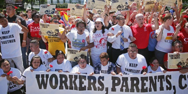 WASHINGTON, DC - AUGUST 28: More than 300 demonstrators marched from the Immigration and Customs Enforcement headquarters to rally outside the White House and demand that President Barack Obama halt deportations August 28, 2014 in Washington, DC. Organized by CASA of Maryland, about 120 of the protesters were arrested after refusing to clear the sidewalk on the north side of the White House. (Photo by Chip Somodevilla/Getty Images)