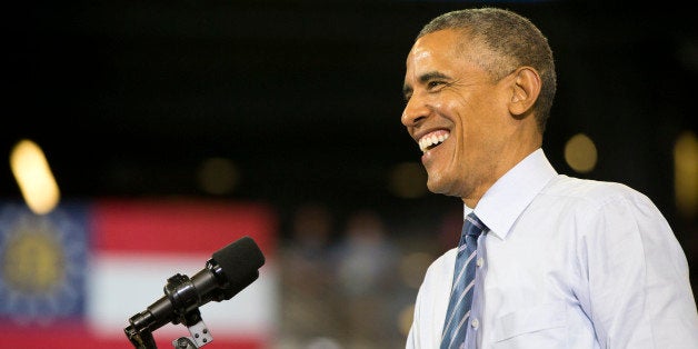 President Barack Obama speaks at Georgia Tech in Atlanta, Tuesday, March 10, 2015, about his plan to clamp down on the private companies that service federal student debt. More than 40 million Americans are in debt thanks to their education, and most of their loans come from Uncle Sam. So President Barack Obama is aiming to clamp down on the private companies that service federal student debt with a presidential memorandum he signed Tuesday. (AP Photo/Jacquelyn Martin)