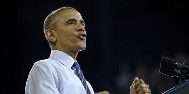 US President Barack Obama speaks at Georgia Tech on March 10, 2015 in Atlanta, Georgia. Obama spoke about making collage more affordable. AFP PHOTO/BRENDAN SMIALOWSKI (Photo credit should read BRENDAN SMIALOWSKI/AFP/Getty Images)