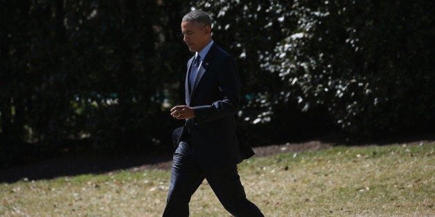 WASHINGTON, DC - MARCH 12: U.S. President Barack Obama walks toward Marine One before departing the White House, March 12, 2