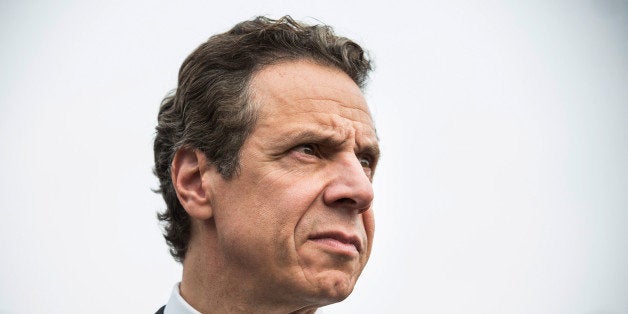 NEW YORK, NY - OCTOBER 29: New York Governor Andrew Cuomo attends a press conference about New York state's program to buy back homes destroyed by Hurricane Sandy and allow mother nature to reclaim the land, two years after Superstorm Sandy damaged the area, on October 29, 2014 in the Oakwood Beach neighborhood of the Staten Island Borough of New York City. Huricane Sandy was recorded as the deadliest and most destructive hurricane of the 2012 Atlantic hurricane season. It caused over $68 billion in damages, and hundreds of people were killed along the path of the storm in seven countries. Today marks the two-year anniversary of its storm surge hitting New York City and the surrounding area which flooded streets, tunnels and subway lines and cut power in and around the city. (Photo by Andrew Burton/Getty Images)