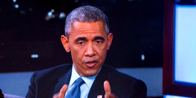 A Secret Service Agent stands by a screen showing a live feed as President Barack Obama talks with Jimmy Kimmel while they are taped on Jimmy Kimmel Live, in Los Angeles, Thursday, March 12, 2015. After the taping the president is expected to attend a DNC event. (AP Photo/Jacquelyn Martin)