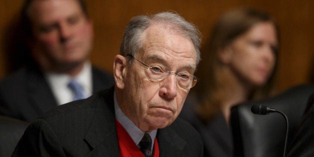 FILE - In this Jan. 29, 2014 file photo, Sen. Chuck Grassley, R-Iowa takes part in a hearing on Capitol Hill in Washington. A Republican majority would usher in major changes in committee leadership, with political opposites replacing the current Democratic chairmen and setting a markedly different agenda from the past eight years of Democratic control. The size of a Republican majority would determine committee ratios and budgets; more seats in the Senate translate into a greater advantage on the panels. (AP Photo/J. Scott Applewhite, File)