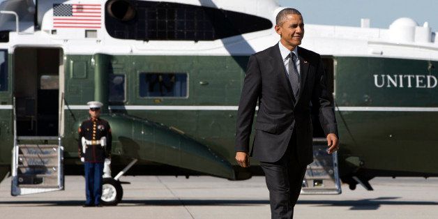 President Barack Obama walks to board Air Force One on departure from Los Angeles International Airport, Friday, March 13, 2015, en route to Phoenix. (AP Photo/Jacquelyn Martin)