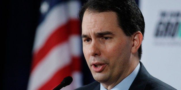 Wisconsin Gov. Scott Walker speaks at the winter meeting of the free market Club for Growth winter economic conference at the Breakers Hotel Saturday, Feb. 28, 2015, in Palm Beach, Fla. (AP Photo/Joe Skipper)