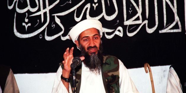 AFGHANISTAN - AUGUST 8: Undated file picture of Saudi dissident Ossama Bin Ladin in an undisclosed place inside Afghanistan. Ossama Bin Ladin speaks while siting in front of a bannar inscribed basic Islamic tenet in Afghanistan. The billionaire Bin Ladin, member of a family of wealthy Saudi construction tycoon, is blamed for two bomb blasts in his home country in 1995-96 that killed 24 US servicemen. AFP PHOTO (Photo credit should read AFP/AFP/Getty Images)