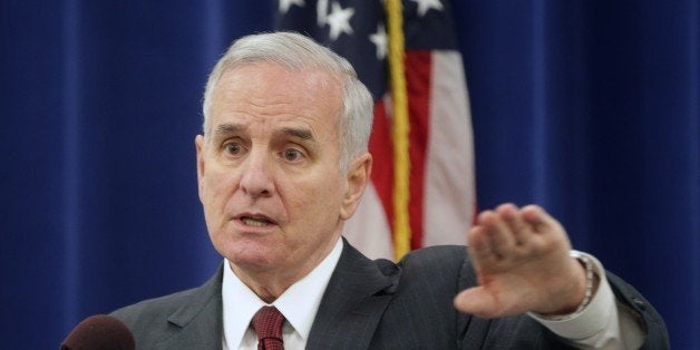 Minnesota Gov. Mark Dayton addresses questions during a post-inaugural news conference, Friday, Jan. 9, 2015, in St. Paul, Mi