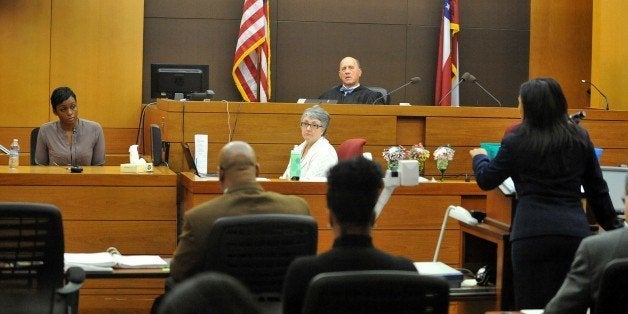 Shayla Smith, a teacher at Dobbs Elementary testifies as testimony resumes after a two week holiday break in the Atlanta Public Schools test-cheating trial before Judge Jerry Baxter in Fulton County Superior Court, in Atlanta, Monday, Jan. 5, 2015. (AP Photo/Atlanta Journal-Constitution, Kent D. Johnson, Pool)