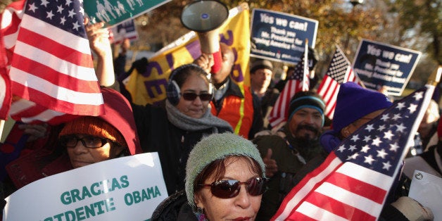 WASHINGTON, DC - NOVEMBER 21: About 100 people gather to rally in support of President Barack Obama's executive action on immigration policy in Lafayette Square across from the White House November 21, 2014 in Washington, DC. Obama announced a plan on Thursday that would ease the threat of deportation for about 4.7 million undocumented immigrants in the United States. (Photo by Chip Somodevilla/Getty Images)