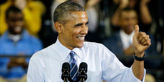 President Barack Obama gestures as he speaks at Georgia Tech in Atlanta, Tuesday, March 10, 2015, about his plan to clamp down on the private companies that service federal student debt. More than 40 million Americans are in debt thanks to their education, and most of their loans come from Uncle Sam. So President Barack Obama is aiming to clamp down on the private companies that service federal student debt with a presidential memorandum he signed Tuesday. (AP Photo/David Goldman)