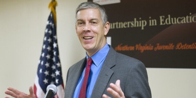 Education Secretary Arne Duncan speaks with reporters after he and Attorney General Eric Holder toured the Northern Virginia Juvenile Detention Center in Alexandria, Va., Monday, Dec. 8, 2014. Holder and Duncan used the event to announce guidelines aimed at providing quality educational services for youth in correctional facilities as part of President Barack Obama's My Brother's Keeper initiative. (AP Photo/Cliff Owen)