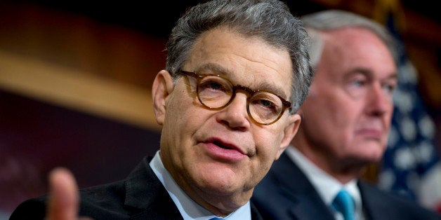 Senator Al Franken, a Democrat from Minnesota, speaks during a news conference on Keystone XL pipeline amendments with Senator Edward 'Ed' Markey, a Democrat from Massachusetts, right, at the U.S. Capitol in Washington, D.C., U.S., on Tuesday, Jan. 20, 2015. Senate Democratic leaders will push hard for full Senate vote on an amendment to Keystone XL pipeline legislation that puts all senators on record on their views about whether carbon emissions spark climate change, said Senator Charles Schumer, the No. 3 Democratic leader. Photographer: Andrew Harrer/Bloomberg via Getty Images