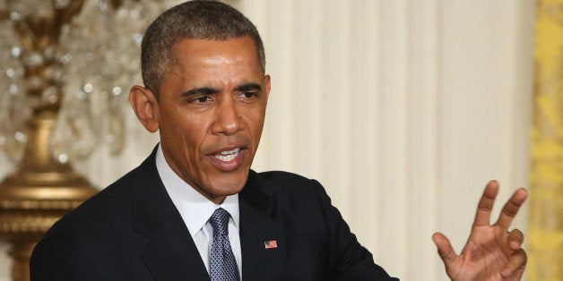 WASHINGTON, DC - JANUARY 16: U.S. President Barack Obama speaks during a news conference with British Prime Minister David Cameron in the East Room of the White House January 16, 2015 in Washington, DC. The two leaders had an Oval Office meeting earlier discussing bilateral issues including economic growth, international trade, cyber security, Iran, ISIL, counterterrorism, Ebola, and Russias actions in Ukraine. (Photo by Mark Wilson/Getty Images)