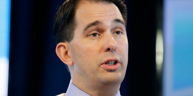 FILE - In this March 7, 2015 file photo, Wisconsin Gov. Scott Walker speaks during the Iowa Agriculture Summit in Des Moines,