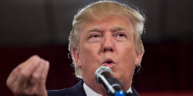 Donald Trump makes his keynote address on Monday, Jan. 19, 2015, at the South Carolina Tea Party Coalition Convention in Myrtle Beach, S.C. (AP Photo/Randall Hill)