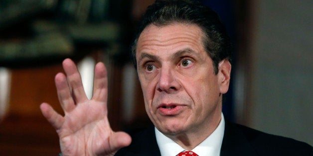 New York Gov. Andrew Cuomo speaks during a news conference in the Red Room at the Capitol on Wednesday, March 18, 2015, in Albany, N.Y. A Quinnipiac University poll says Cuomo's approval rating has dropped to its lowest point amid an ongoing fight with teachers unions. (AP Photo/Mike Groll)