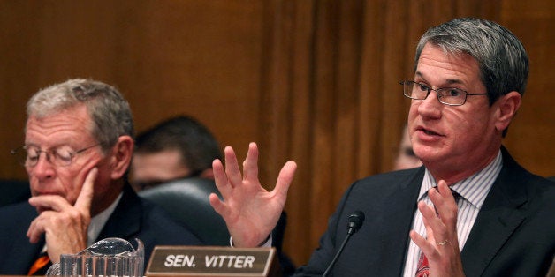 WASHINGTON, DC - JULY 23: Sen. David Vitter (R-LA) (R) questions EPA Administrator Gina McCarthy while Sen. James Inhofe (R-OK) listens during a Senate Environment and Public Works Committee on Capitol Hill, July 23, 2014 in Washington, DC. The committee heard testimony on EPA's proposed carbon pollution standards for existing power plants. (Photo by Mark Wilson/Getty Images)