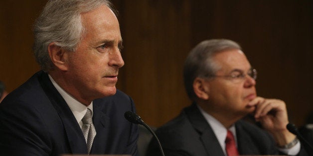 WASHINGTON, DC - MARCH 11: Chairman Sen. Bob Corker (R-TN) (L) and ranking member Sen. Bob Menendez (D-NJ) listen to testimony during a Senate Foreign Relations Committee hearing on Capitol Hill, March 11, 2015 in Washington, DC. The committee was hearing testimony from top administration officials on President Obamas request to Congress for authorization to use force against ISIS. (Photo by Mark Wilson/Getty Images)