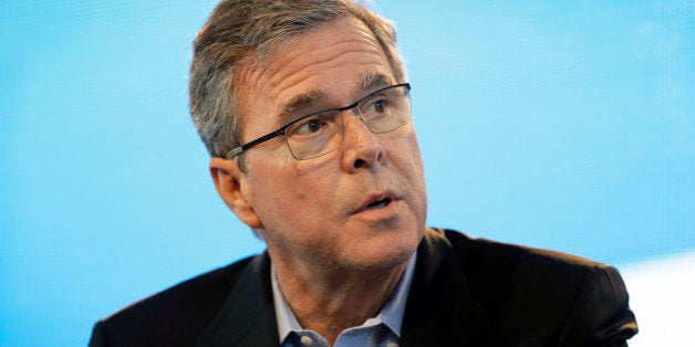 FILE - In this March 7, 2015, file photo, former Florida Gov. Jeb Bush speaks during the Iowa Agriculture Summit in Des Moines, Iowa. As he prepared for a run for the White House, Bush resigned from corporate positions. And while little noticed at the time, Florida timber Rayonier Inc., faced a flurry of lawsuits not long before his exit. (AP Photo/Charlie Neibergall, File)