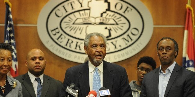 Mayor Theodore Hoskins addresses the media at the City of Berkeley City Hall in Berkeley, Missouri on December 24, 2014. In the latest incident to fuel mounting tensions over a spate of police killings, a black teenager was shot dead by a white officer in Berkeley, Missouri after he allegedly pointed a gun at the officer. The incident took place late December 22 at a gas station in the town near Ferguson, Missouri where another black teen was shot dead by a white officer last August. St Louis county police chief Jon Belmar said the officer was called to the gas station about a theft and when he arrived two men approached the police car. The suspect then pointed a nine-millimeter pistol at the officer, who drew his own weapon and fired three shots, one fatally striking the suspect. AFP PHOTO/MICHAEL B. THOMAS (Photo credit should read Michael B. Thomas/AFP/Getty Images)