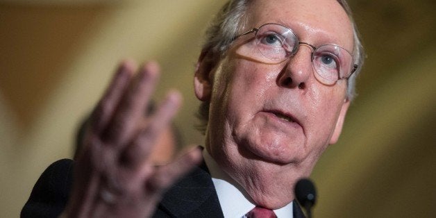 US Senate Majority Leader Mitch McConnell, R-KY, speaks to the press at the US Capitol in Washington, DC, on March 10, 2015. AFP PHOTO/NICHOLAS KAMM (Photo credit should read NICHOLAS KAMM/AFP/Getty Images)