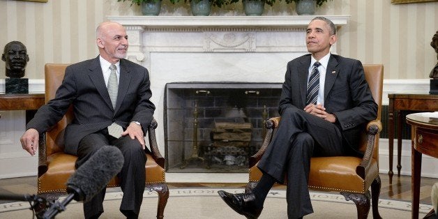 WASHINGTON, DC - MARCH 24: U.S. President Barack Obama poses with Afghan President Ghani during a restricted bilateral meetin