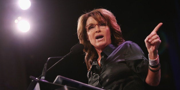 DES MOINES, IA - JANUARY 24: Former Alaska Governor Sarah Palin speaks to guests at the Iowa Freedom Summit on January 24, 2015 in Des Moines, Iowa. The summit is hosting a group of potential 2016 Republican presidential candidates to discuss core conservative principles ahead of the January 2016 Iowa Caucuses. (Photo by Scott Olson/Getty Images)