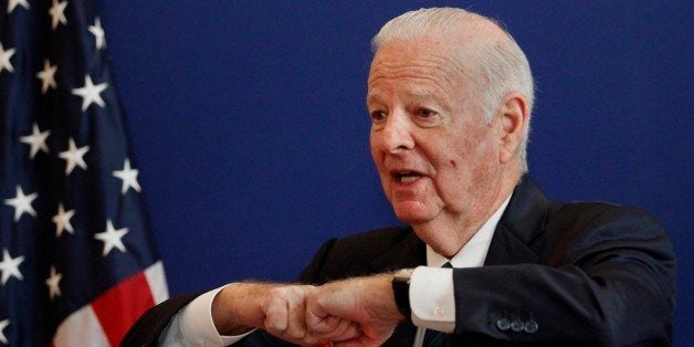 Former U.S. Secretary of State James Baker gestures as he speaks at the funeral service of former Georgian President Eduard Shevardnadze in Tbilisi, Georgia, Sunday, July 13, 2014. Soviet foreign minister and Georgiaâs former president Eduard Shevardnadze has been buried next to his wife in the the Krtsanisi Presidential Residence of Tbilisi, after his death on Monday at 86. (AP Photo/Shakh Aivazov)