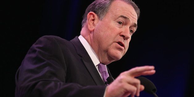 DES MOINES, IA - JANUARY 24: Former Governor of Arkansas Mike Huckabee speaks to guests at the Iowa Freedom Summit on January 24, 2015 in Des Moines, Iowa. The summit is hosting a group of potential 2016 Republican presidential candidates to discuss core conservative principles ahead of the January 2016 Iowa Caucuses. (Photo by Scott Olson/Getty Images)