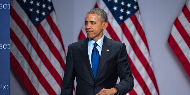 President Barack Obama arrives to speak at the SelectUSA Investment Summit, hosted by the Commerce Department, Monday, March 23, 2015, in National Harbor, Md. (AP Photo/Cliff Owen)