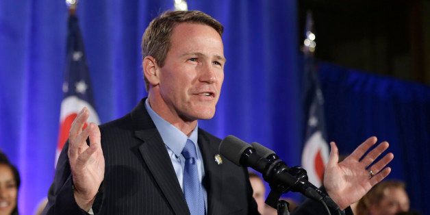 Ohio Secretary of State Jon Husted speaks to supporters at the Ohio Republican Party celebration Tuesday, Nov. 4, 2014, in Columbus, Ohio. Husted beat state Sen. Nina Turner of Cleveland. (AP Photo/Tony Dejak)