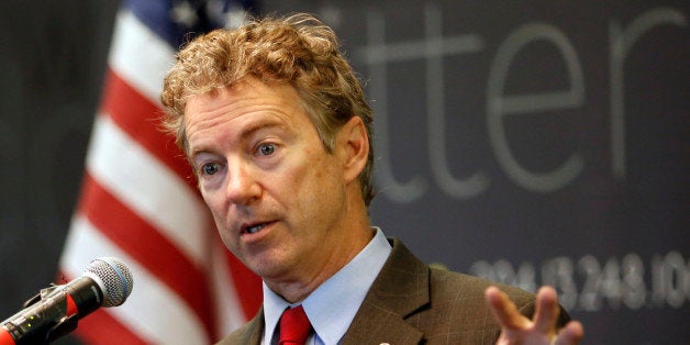 Sen., Rand Paul, R-Ky. speaks to employees during a visit to Dyn, an internet performance company, Friday, March 20, 2015, in Manchester, N.H. (AP Photo/Jim Cole)