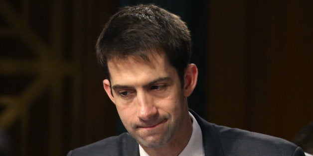 WASHINGTON, DC - MARCH 18: Sen. Tom Cotton (R-AK) looks at his papers during a Senate Armed Services Committee hearing on Capitol Hill March 18, 2015 in Washington, DC. The committee was hearing testimony on President Obamas Defense Authorization Request for FY2016 for the Department of the Army and the Department of the Air Force. (Photo by Mark Wilson/Getty Images)