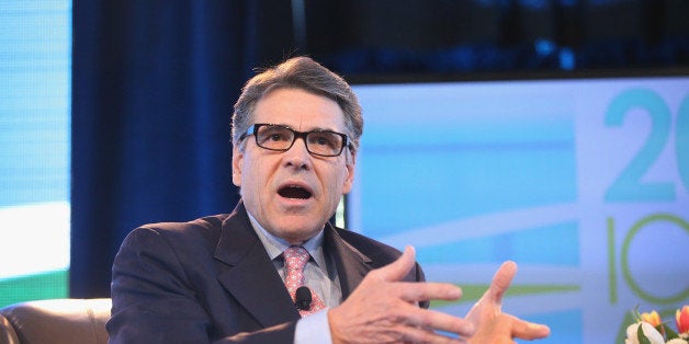 DES MOINES, IA - MARCH 07: Former Texas Governor Rick Perry fields questions from Bruce Rastetter at the Iowa Ag Summit on M