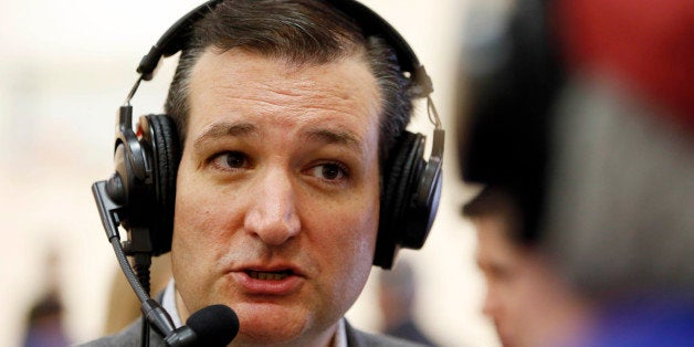 U.S. Sen. Ted Cruz, R-Texas, a tea party favorite and possible presidential candidate in 2016, is interviewed by Skip Murphy during a visit to the Strafford County Republican Committee Chili and Chat on Sunday, March 15, 2015, in Barrington, N.H. (AP Photo/Jim Cole)