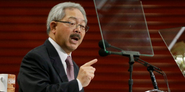 San Francisco Mayor Ed Lee gestures while delivering his State of the City address at a new facility of the Wholesale Produce Market Thursday, Jan. 15, 2015, in San Francisco. With San Francisco's home prices soaring, the mayor unveiled plans to try to increase the city's stock of affordable housing and help more people buy homes. In his speech on Thursday, Lee proposed an additional $100 million over ten years for a city program that loans first-time home buyers up to $200,000 for a down payment. He also proposed a bond measure to build and rehabilitate more housing for poor and middle income residents. (AP Photo/Eric Risberg)