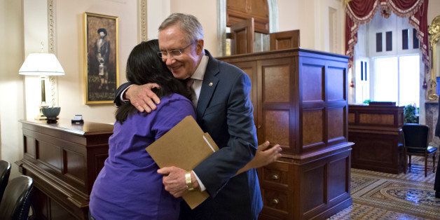 Senate Majority Leader Harry Reid, D-Nev., embraces Astrid Silva, of Las Vegas, at the Capitol in Washington, Thursday, June 27, 2013. Silva is a DREAM Act supporter whose family came to the U.S. from Mexico illegally and whose story has been an inspiration for Reid during work on the immigration reform bill. Reid carries a folder with letters from Astrid Silva that he read on the Senate floor before the historic vote. (AP Photo/J. Scott Applewhite)
