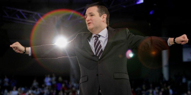 U.S. Senator Ted Cruz, a Republican from Texas, marks the start of his presidential campaign by giving the convocation address at Liberty University in Lynchburg, Virginia, U.S., on Monday, March 23, 2015. By kicking off his campaign at the Virginia Christian college founded by the late evangelist Jerry Falwell, rather than a venue in his home state, Cruz is signaling hell court religious conservatives as well as small-government tea-party activists as he competes to become the lead anti-establishment candidate in the party contest. Photographer: Jay Paul/Bloomberg via Getty Images 