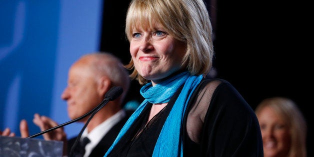 In this Nov. 4, 2014 photo, Republican Colorado Attorney General-elect Cynthia Coffman speaks to supporters during the GOP election night gathering, in Denver, Colo. Coffman is to take the oath of office on Tuesday, Jan. 13, 2015. (AP Photo/Brennan Linsley)